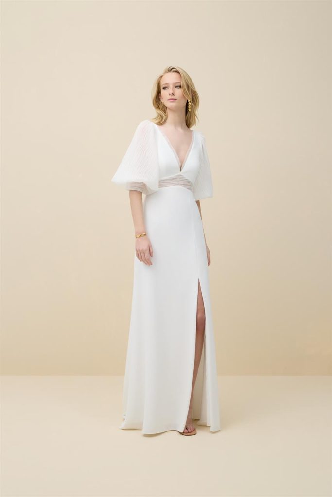 Hochzeitskleid mit Puffärmeln und V-Ausschnitt. Perfekt für deine Strandhochzeit.