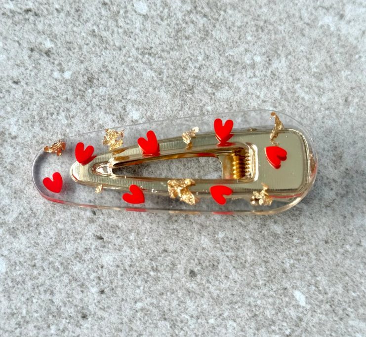Haarspange mit roten Herzen und Battgold